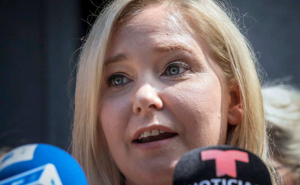 FILE - Virginia Roberts Giuffre speaks during a news conference outside a Manhattan court in New York, Aug. 27, 2019. (AP Photo/Bebeto Matthews, File)