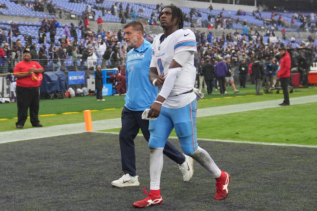 Tennessee Titans quarterback Cam Ward (1) walks off the field after the team's loss in an NFL football game against the Baltimore Ravens in Baltimore, Sunday, Oct. 4, 2026. (AP Photo/Stephanie Scarbrough)
