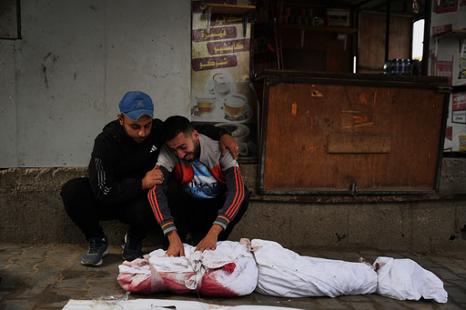 Yahya Eid mourns over the body of his 10-year-old nephew, Shabaan Eid, who was killed in an Israeli army strike on the Bureij camp, during his funeral at Al-Awda Hospital in Nuseirat, central Gaza Strip, Wednesday, Oct. 29, 2025. (AP Photo/Abdel Kareem Hana) Yahya Eid mourns over the body of his 10-year-old nephew, Shabaan Eid, who was killed in an Israeli army strike on the Bureij camp, during his funeral at Al-Awda Hospital in Nuseirat, central Gaza Strip, Wednesday, Oct. 29, 2025. (AP Photo/Abdel Kareem Hana)