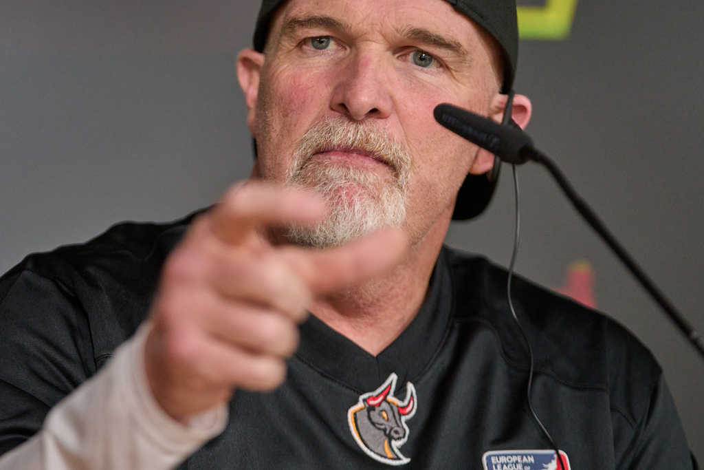 Washington Commanders head coach Dan Quinn gives a press conference in Madrid, Spain, Wednesday, Nov. 12, 2025, ahead of Sunday's NFL football game against Miami Dolphins. (AP Photo/Bernat Armangue)