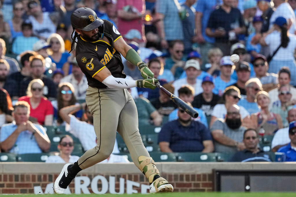 San Diego Padres' Fernando Tatis Jr. hits a solo home run during the first inning of a baseball game against the Chicago Cubs in Chicago, Tuesday, June 30, 2026. (AP Photo/Nam Y. Huh)