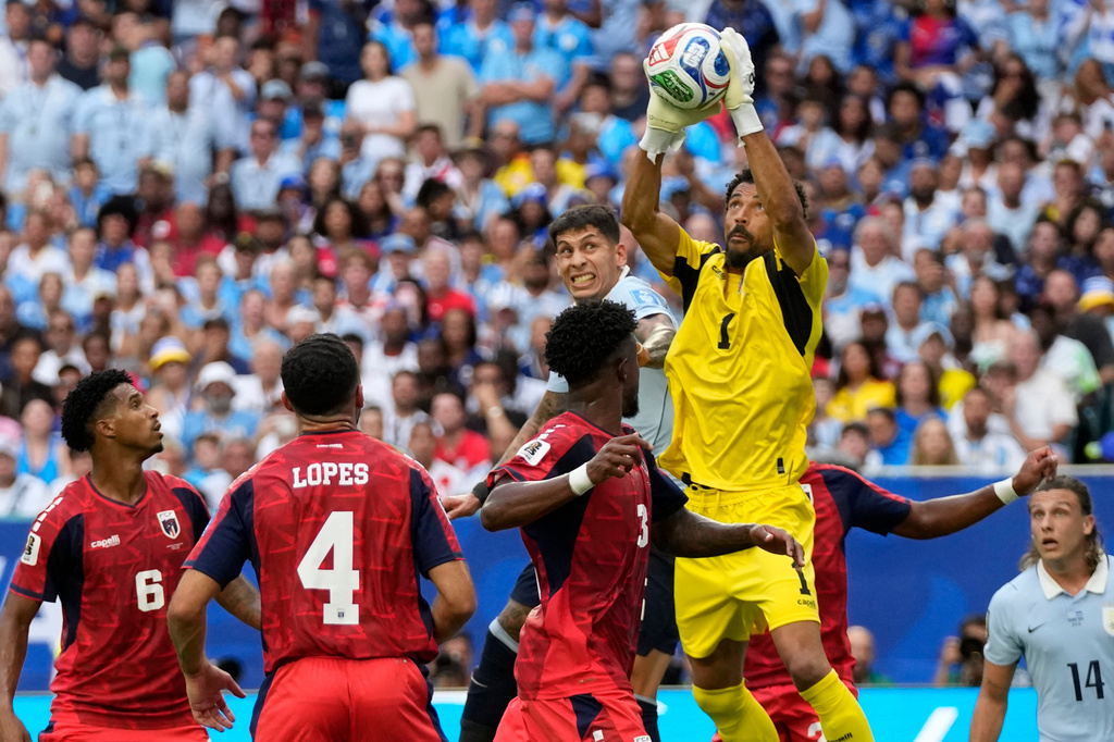 Cape Verde goalkeeper Vozinha (1) catches the ball during the World Cup Group H soccer match against Uruguay in Miami Gardens, Fla., Sunday, June 21, 2026. (AP Photo/Lynne Sladky)