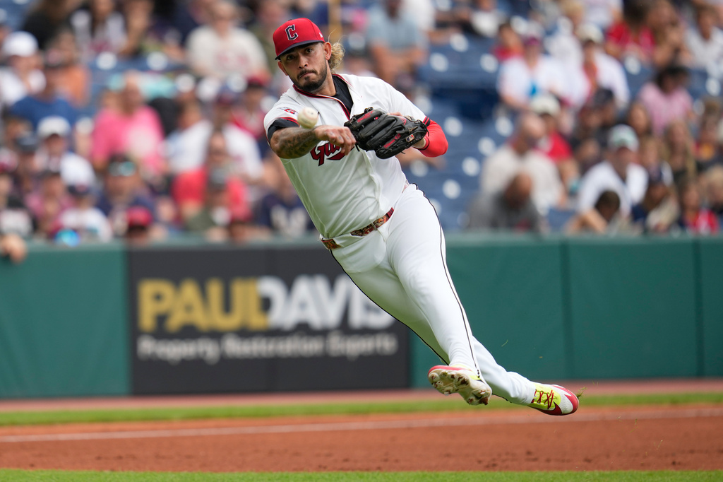 Cleveland Guardians third baseman Gabriel Arias throws out Arizona Diamondbacks' Tyler Locklear at first base in the third inning of a baseball game in Cleveland, Sunday, Aug. 2, 2026. (AP Photo/Sue Ogrocki)