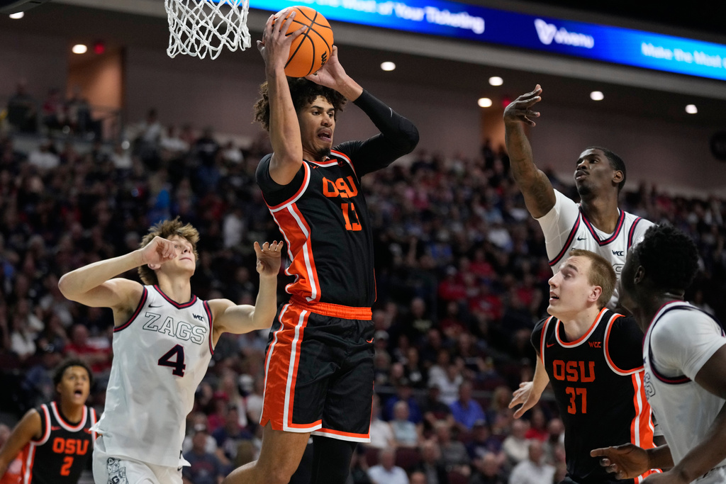 Oregon State forward Isaiah Sy (13) grabs a rebound against Gonzaga during the first half of an NCAA college basketball semifinal game in the West Coast Conference men's tournament Monday, March 9, 2026, in Las Vegas. (AP Photo/John Locher)