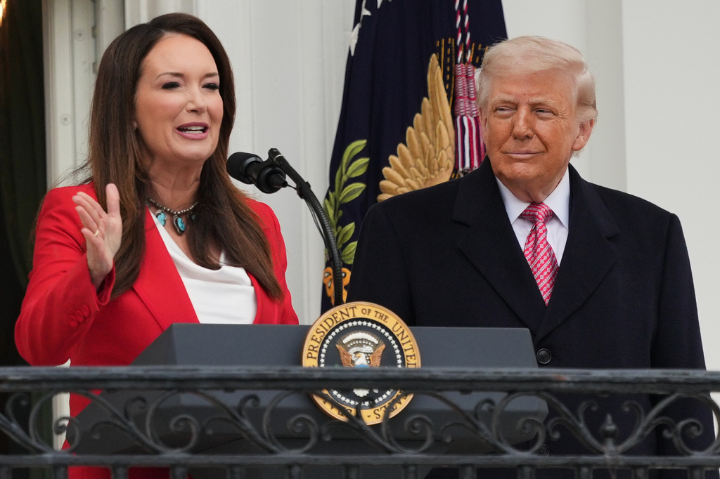 President Donald Trump listens to Agriculture Secretary Brooke Rollins speak during an event with farmers on the South Lawn of the White House, Friday, March 27, 2026, in Washington. (AP Photo/Julia Demaree Nikhinson)