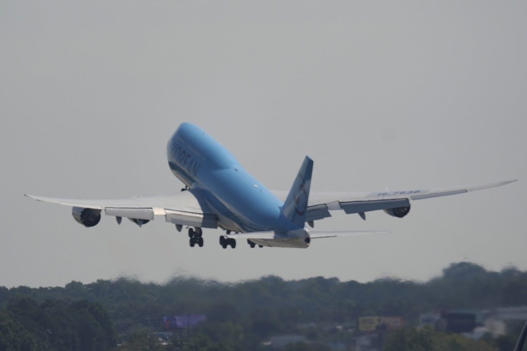 A Korean Air charter plane carrying Korean workers detained in immigration raid at Georgia factory leaves Hartsfield-Jackson International Airport in Atlanta bound for South Korea, Thursday, Sept. 11, 2025. (AP Photo/George Walker IV)