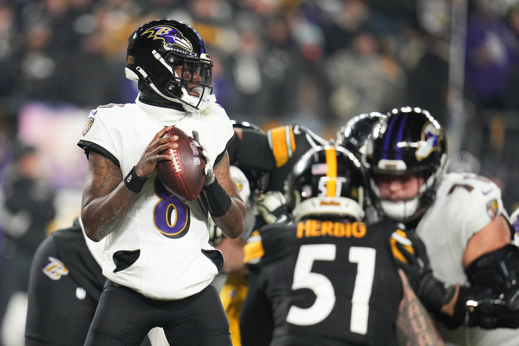 Baltimore Ravens quarterback Lamar Jackson (8) looks to throw during the first half of an NFL football game against the Pittsburgh Steelers, Sunday, Jan. 4, 2026, in Pittsburgh. (AP Photo/Gene J. Puskar)