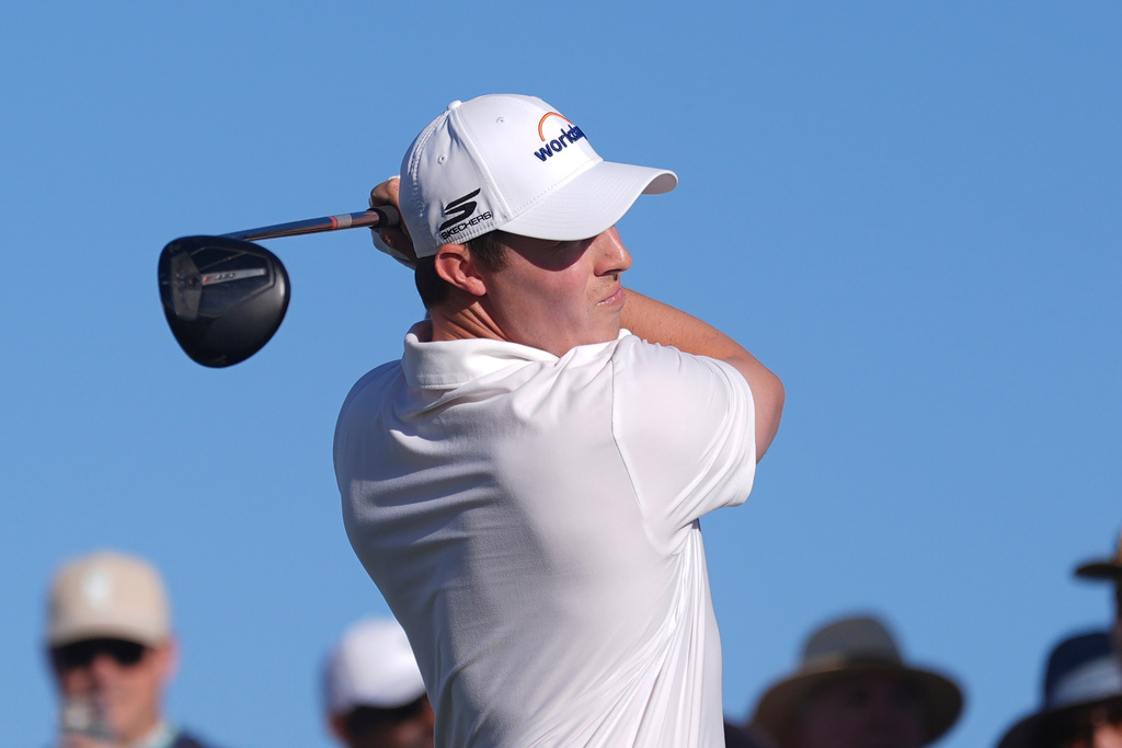 Matt Fitzpatrick, of England, hits his tee shot at the 15th hole during the first round of the Phoenix Open golf tournament at the TPC Scottsdale Stadium Course Thursday, Feb. 5, 2026, in Scottsdale, Ariz. (AP Photo/Ross D. Franklin)