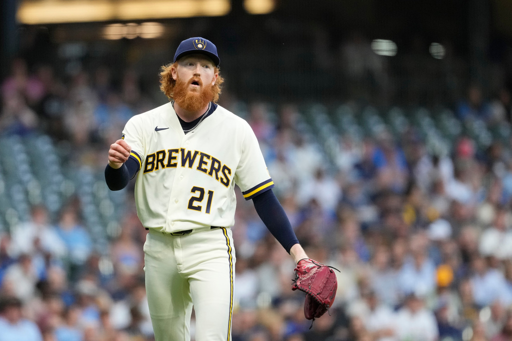 Milwaukee Brewers' Dustin May reacts during the second inning of a baseball game against the Seattle Mariners, Wednesday, Aug. 19, 2026, in Milwaukee. (AP Photo/Aaron Gash)