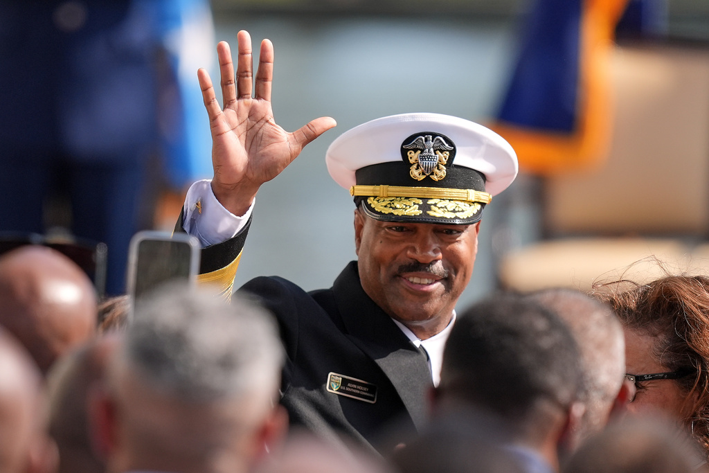 Navy Adm. Alvin Holsey waves at the end of his relinquishment of command and retirement ceremony, at U.S. Southern Command, Friday, Dec. 12, 2025, in Doral, Fla. (AP Photo/Rebecca Blackwell)