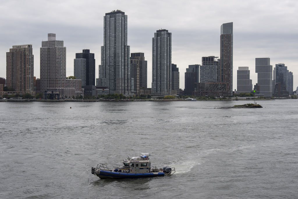 US Coast Guard boat float on the East River near the United Nations Headquarters in New York, Monday, Sept. 22, 2025. (AP Photo/Yuki Iwamura)