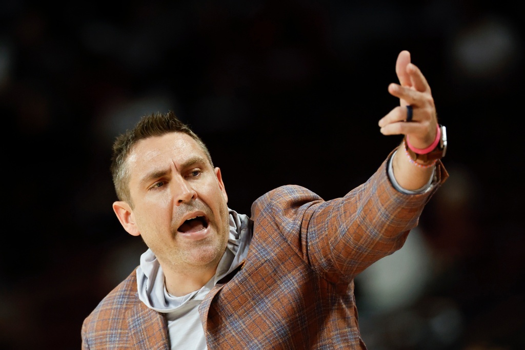 Clemson head coach Shawn Poppie motions to his bench during the first half of the first round of the NCAA college basketball tournament against Southern California, Saturday, March 21, 2026, in Columbia, S.C. (AP Photo/Nell Redmond)
