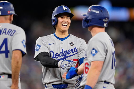 Los Angeles Dodgers' Shohei Ohtani and Will Smith talk during the eighth inning in Game 6 of baseball's World Series against the Toronto Blue Jays, Friday, Oct. 31, 2025, in Toronto. (AP Photo/Brynn Anderson) Los Angeles Dodgers' Shohei Ohtani and Will Smith talk during the eighth inning in Game 6 of baseball's World Series against the Toronto Blue Jays, Friday, Oct. 31, 2025, in Toronto. (AP Photo/Brynn Anderson)