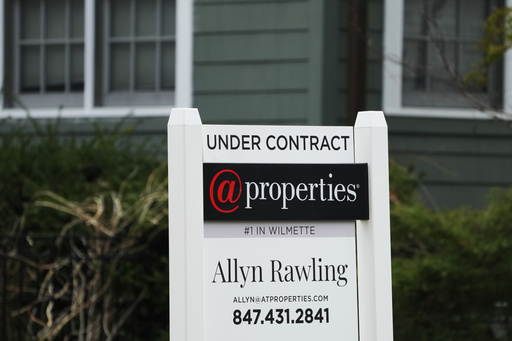 An &quot;Under Contract&quot; sign is displayed at a home in Wilmette, Ill., Thursday, March 28, 2024. On Thursday, April 25, 2024, Freddie Mac reports on this week&rsquo;s average U.S. mortgage rates. (AP Photo/Nam Y. Huh)