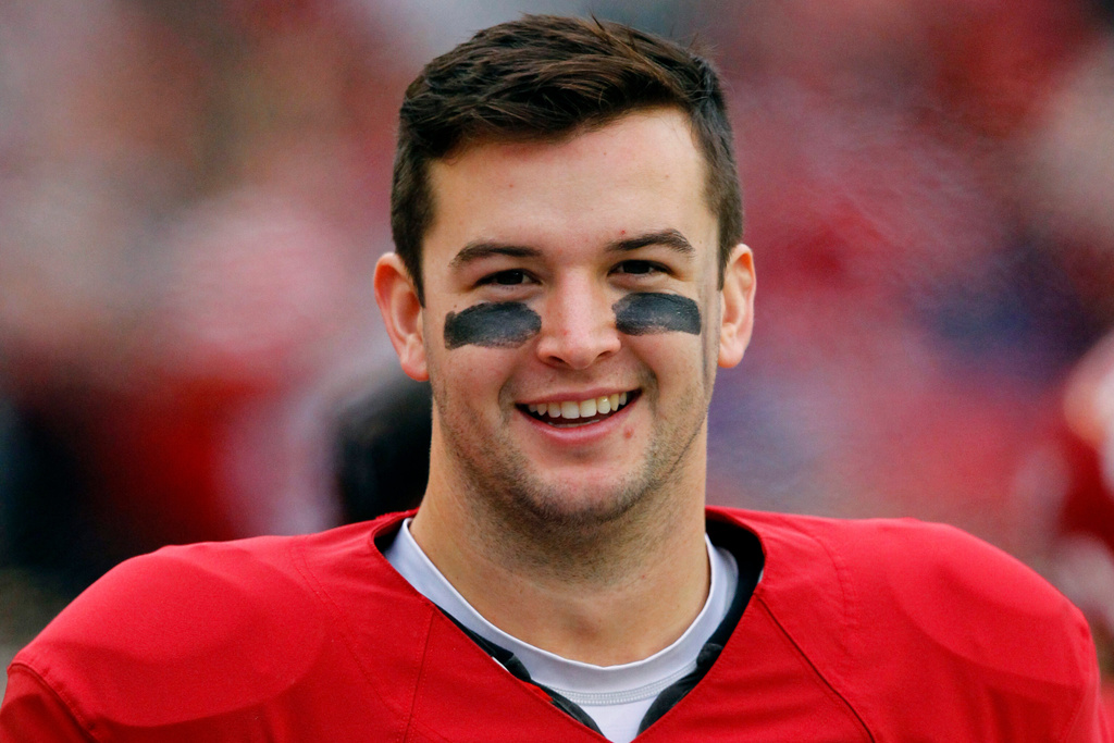 FILE - Alabama quarterback AJ McCarron (10) smiles on sideline during an NCAA college football game against Chattanooga in Tuscaloosa, Ala., Nov. 23, 2013. (AP Photo/Butch Dill, File)