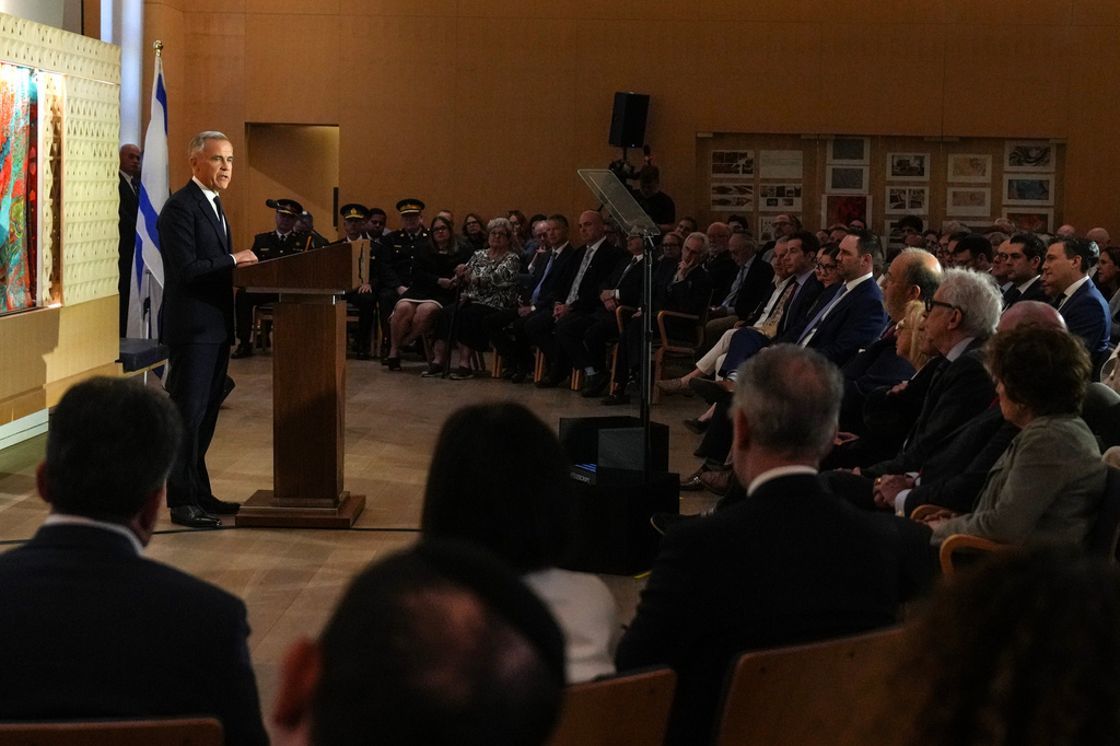 Canadian Prime Minister Mark Carney speaks to community leaders and community members at Holy Blossom Temple in Toronto on Monday, June 1 2026. (Chris Young/The Canadian Press via AP)