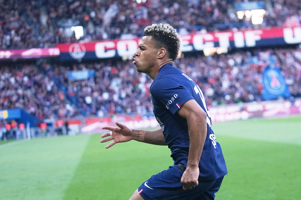 PSG's Desire Doue celebrates his goal during the French League One soccer match between Paris Saint-Germain and Nantes in Paris, France, Wednesday, April 22, 2026. (AP Photo/Michel Euler)