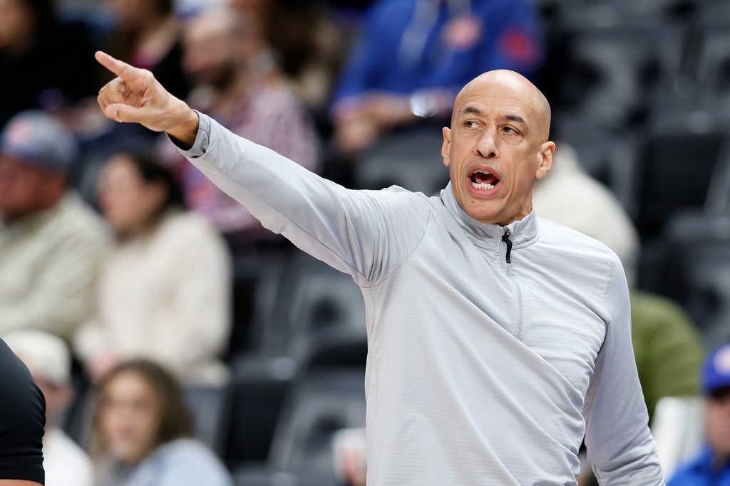 Sacramento Kings head coach Doug Christie directs his team during the first half of an NBA basketball game against the Detroit Pistons, Sunday, Jan. 25, 2026, in Detroit. (AP Photo/Duane Burleson)