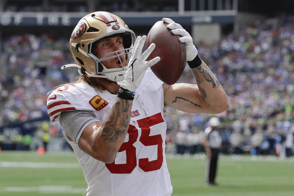 San Francisco 49ers tight end George Kittle (85) celebrates after scoring a touchdown during the first half of an NFL football game against the Seattle Seahawks, Sunday, Sept. 7, 2025, in Seattle. (AP Photo/John Froschauer)