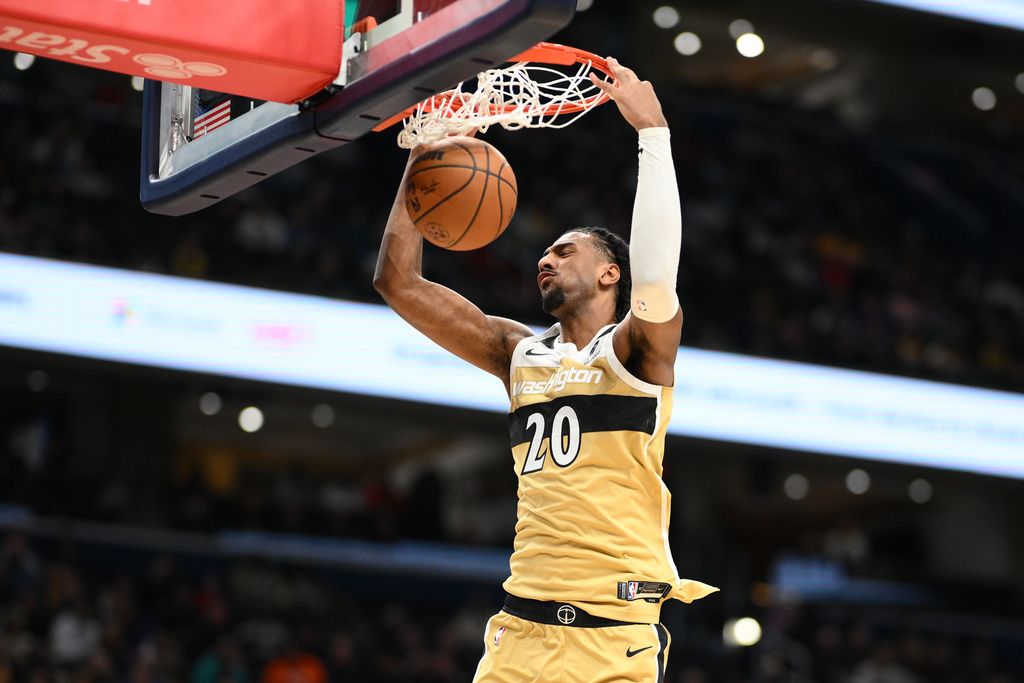 Washington Wizards center Alex Sarr dunks during the first half of an NBA basketball game against the Los Angeles Lakers, Friday, Jan. 30, 2026, in Washington. (AP Photo/Nick Wass)
