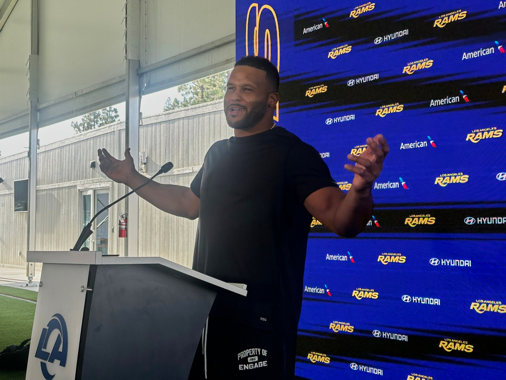Aaron Donald speaks to the media at the Los Angeles Rams' training complex in Los Angeles, Sunday, Aug. 30, 2026. (AP Photo/Greg Beacham)