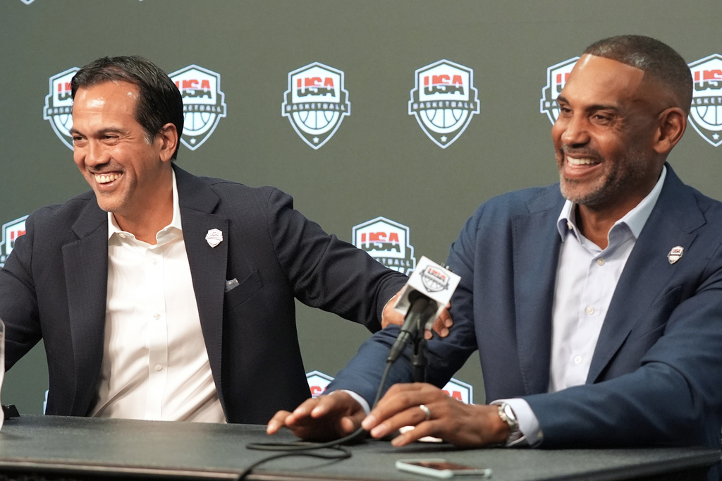Erik Spoelstra, USA Basketball men's national team head coach, left, and Grant Hill, USA Basketball men's national team managing director speak during a news conference Thursday, Oct. 16, 2025, in Miami. (AP Photo/Marta Lavandier)