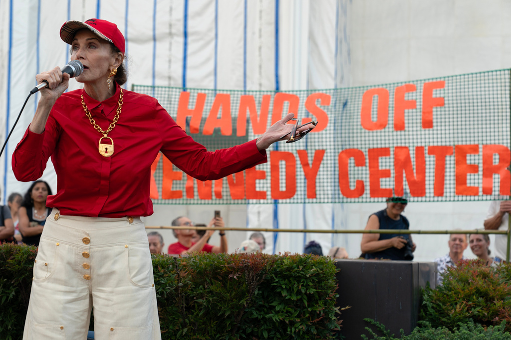 Actress Lynda Carter speaks to the crowd as they rally against the closing of the John F. Kennedy Center for the Performing Arts on Friday, Sept. 18, 2026, in Washington. ( (AP Photo/Jose Luis Magana)