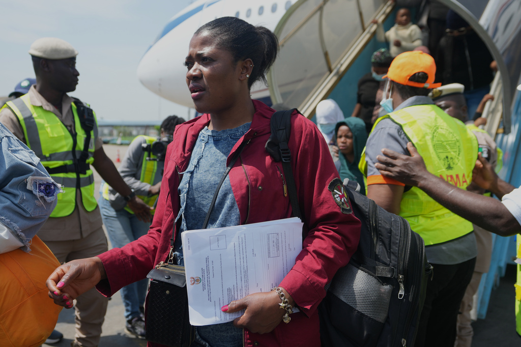 Nigerian nationals repatriated from South Africa, following concerns about unrest, arrive at the Murtala Muhammed International Airport in Lagos, Nigeria, Thursday, June 11, 2026. (AP Photo/Sunday Alamba)