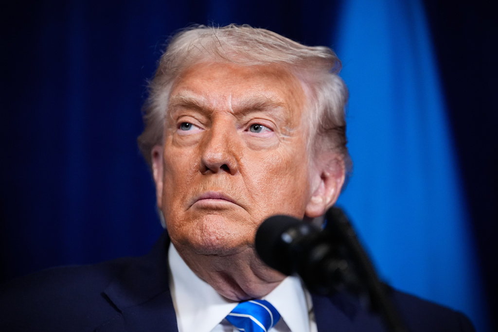 President Donald Trump attends a joint news conference with Ukraine's President Volodymyr Zelenskyy following a meeting at Trump's Mar-a-Lago club, Sunday, Dec. 28, 2025, in Palm Beach, Fla. (AP Photo/Alex Brandon)