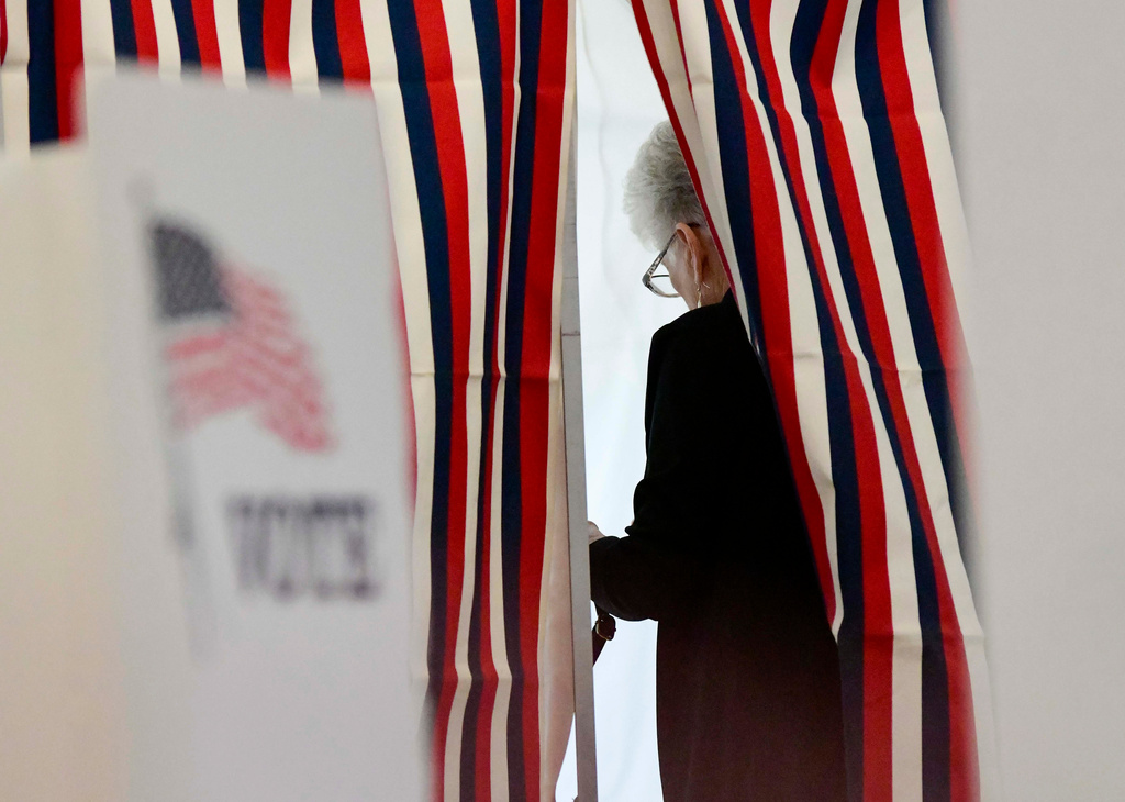 Camille Coulborn of Chesterfield, N.H., fills out her ballot inside a voting booth in Chesterfield during the New Hampshire State Primaries on Tuesday, Sept. 8, 2026. (Kristopher Radder/The Brattleboro Reformer via AP)