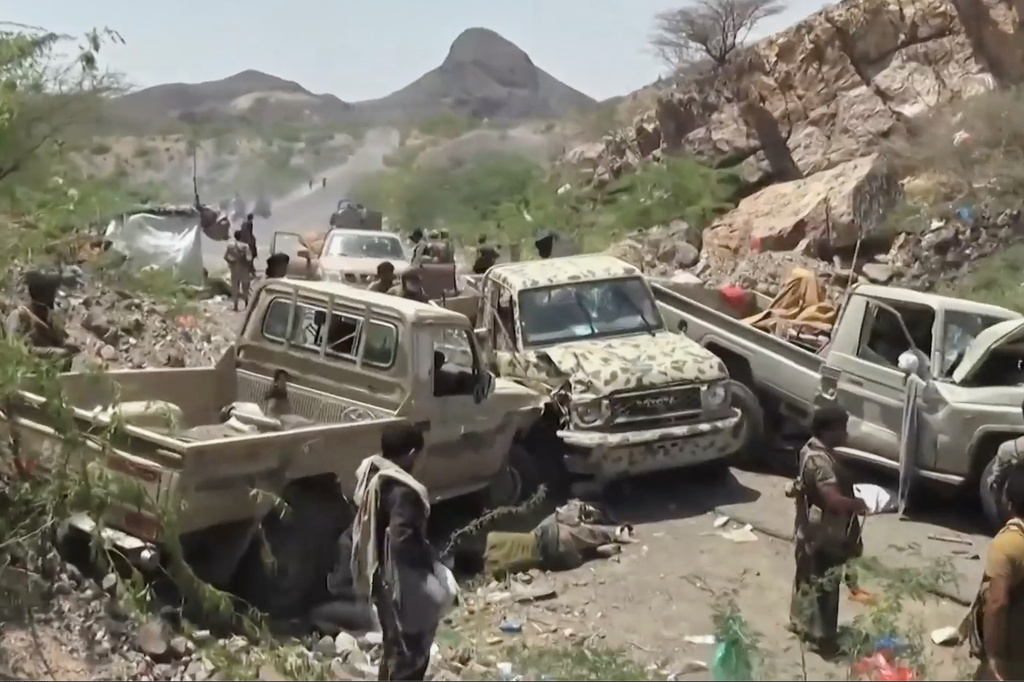 This image taken from undated video released by the Ansar Allah Media Office, the media arm of Yemen's Houthi rebels, on Saturday, Sept. 12, 2026, shows, according to the group, Houthi fighters among vehicles abandoned by Saudi-backed forces during a Houthi advance at an undisclosed location in southern Yemen. (Ansar Allah Media Office via AP)