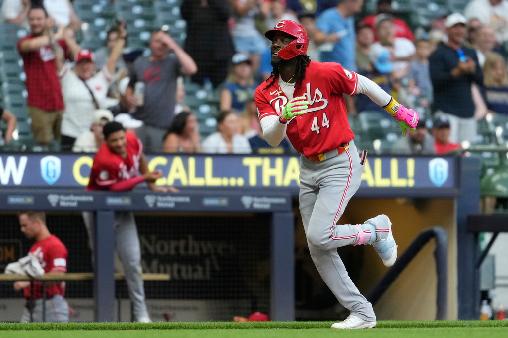 Cincinnati Reds' Elly De La Cruz (44) smiles as he rounds the base after hitting a two-run home run during the fifth inning of a baseball game against the Milwaukee Brewers, Monday, June 29, 2026, in Milwaukee. (AP Photo/Aaron Gash)