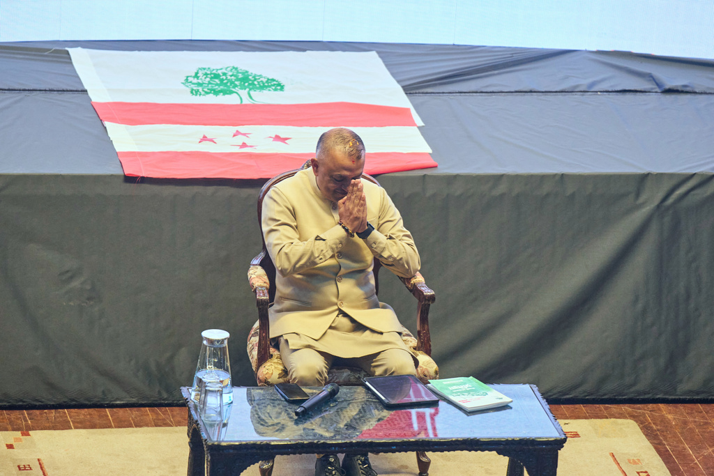 Gagan Thapa, president of Nepali congress party greets supporters during an election campaign in Kathmandu, Nepal, Feb. 19, 2026. (AP Photo/Niranjan Shrestha)