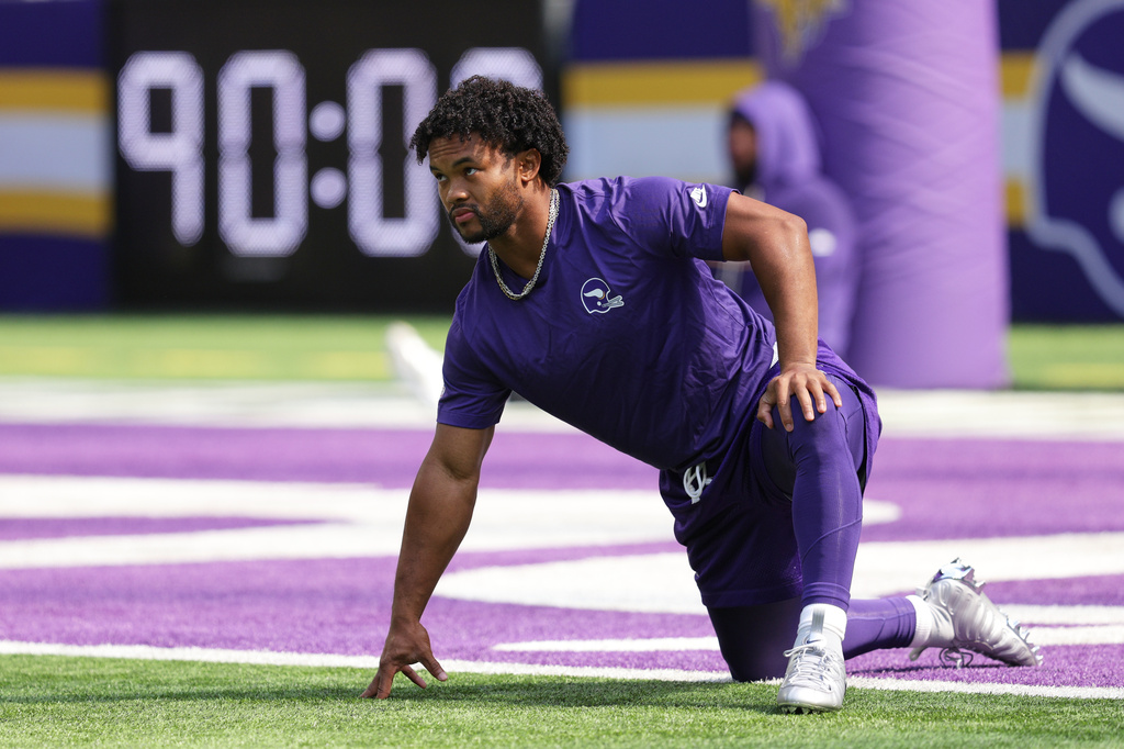 Minnesota Vikings quarterback Kyler Murray warms up before an NFL football game against the Green Bay Packers, Sunday, Sept. 13, 2026, in Minneapolis, Minn. (AP Photo/Bailey Hillesheim)