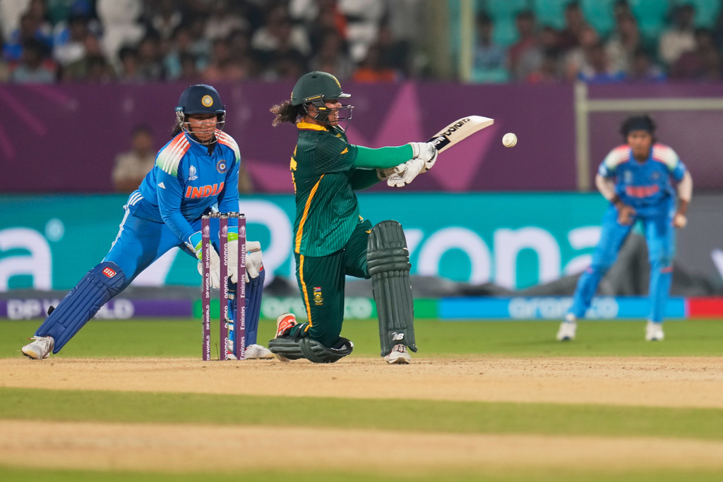 South Africa's Chole Tryon plays a shot during the ICC Women's Cricket World Cup match between India and South Africa at ACA-VDCA Cricket Stadium in Visakhapatnam, India, Thursday, Oct. 9, 2025. (AP Photo/Aijaz Rahi)