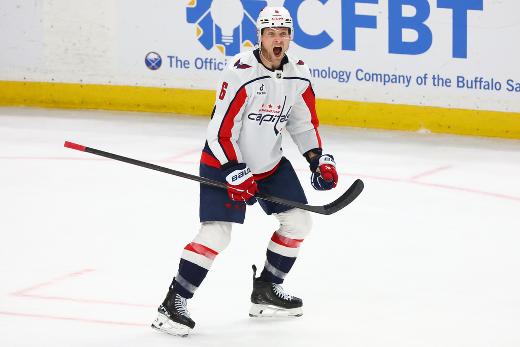 Washington Capitals defenseman Jakob Chychrun celebrates his game winning goal during the third period of an NHL hockey game against the Buffalo Sabres, Thursday, March 12, 2026, in Buffalo, N.Y. (AP Photo/Jeffrey T. Barnes)