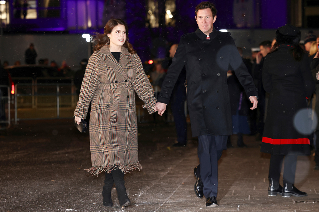 FILE - Britain's Britain's Princess Eugenie and Jack Brooksbank attend the Together At Christmas carol service at Westminster Abbey, in London, Thursday, Dec. 15, 2022. (Henry Nicholls/Pool Photo via AP, File)