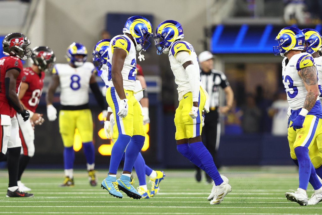 Los Angeles Rams cornerback Emmanuel Forbes Jr. (1) celebrates with safety Kamren Kinchens (26) during the first half against the Tampa Bay Buccaneers in an NFL football game, Sunday, Nov. 23, 2025, in Inglewood, Calif. (AP Photo/Jessie Alcheh)