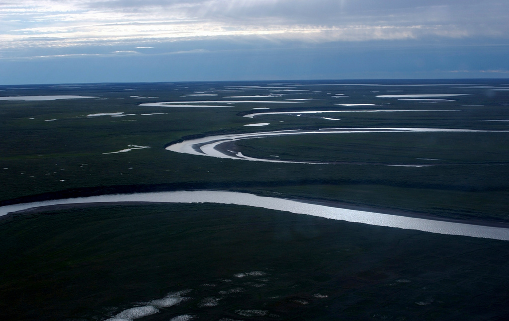 FILE - This photo provided by the United States Geological Survey shows Fish Creek through the National Petroleum Reserve-Alaska, managed by the Bureau of Land Management, on Alaska's North Slope on July 8, 2004. (David W. Houseknecht/United States Geological Survey via AP, File)