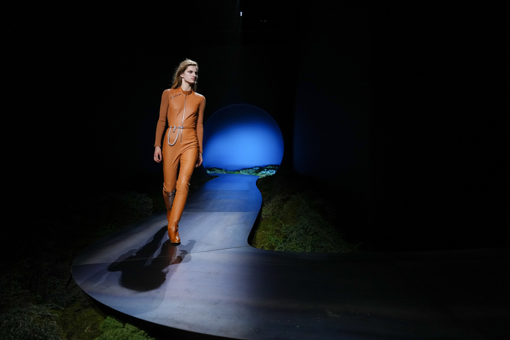 A model wears a creation as part of the Hermes Fall/Winter 2026-2027 Women's collection presented in Paris, Saturday, March 7, 2026. (AP Photo/Aurelien Morissard)