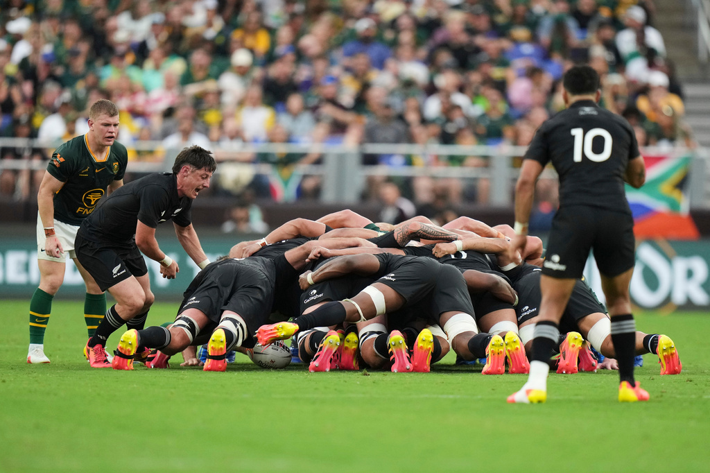 New Zealand's Cam Roigard reacts as he waits for the ball as South Africa's Morne van den Berg, left, watches during their rugby international in Baltimore, USA, Saturday, Sept. 12, 2026. (AP Photo/Stephanie Scarbrough)
