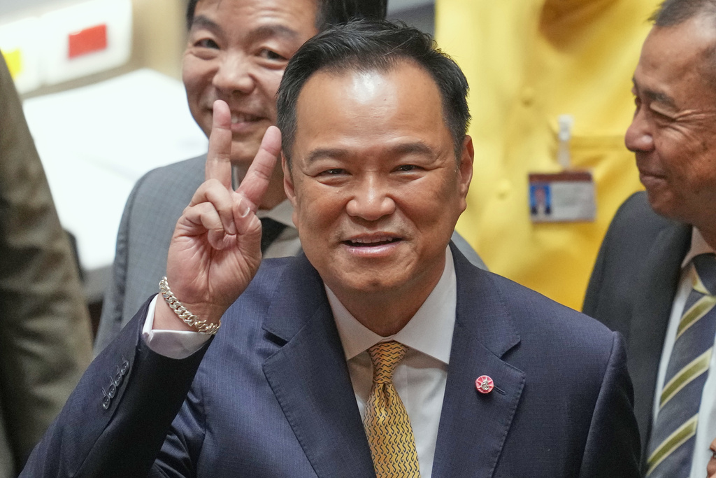 Thailand's Prime Minister Anutin Charnvirakul reacts before he presents the policy statement at the Parliament in Bangkok, Thailand, Monday, Sept. 29, 2025. (AP Photo/Sakchai Lalit)