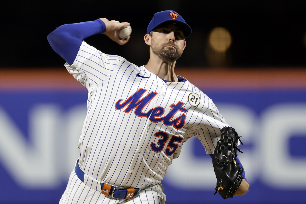 New York Mets pitcher Clay Holmes throws during the second inning of a baseball game against the San Diego Padres, Tuesday, Sept. 16, 2025, in New York. (AP Photo/Adam Hunger)