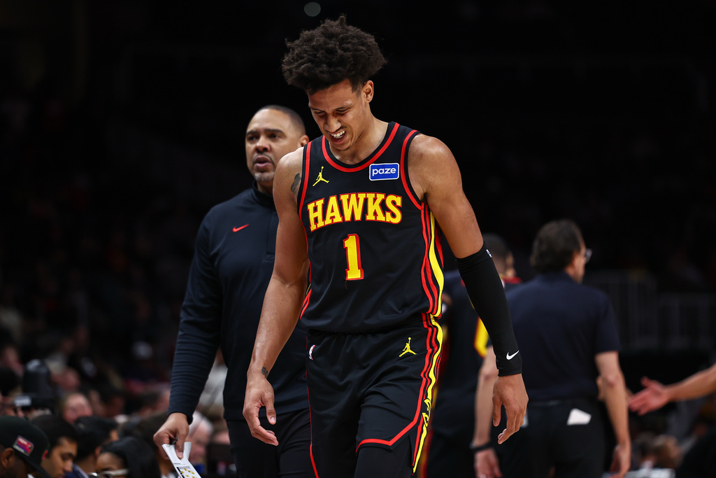 Atlanta Hawks forward Jalen Johnson exits the game during the first half of an NBA basketball game against the Washington Wizards, Tuesday, Feb. 24, 2026, in Atlanta. (AP Photo/Colin Hubbard)