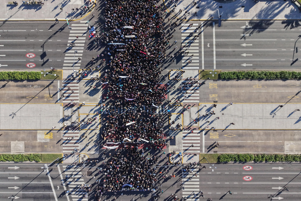 Demonstrators march to demand President Javier Milei's government comply with a University of Buenos Aires (UBA) funding law, amid deep budget cuts in Buenos Aires, Argentina, Tuesday, May 12, 2026. (AP Photo/Rodrigo Abd)
