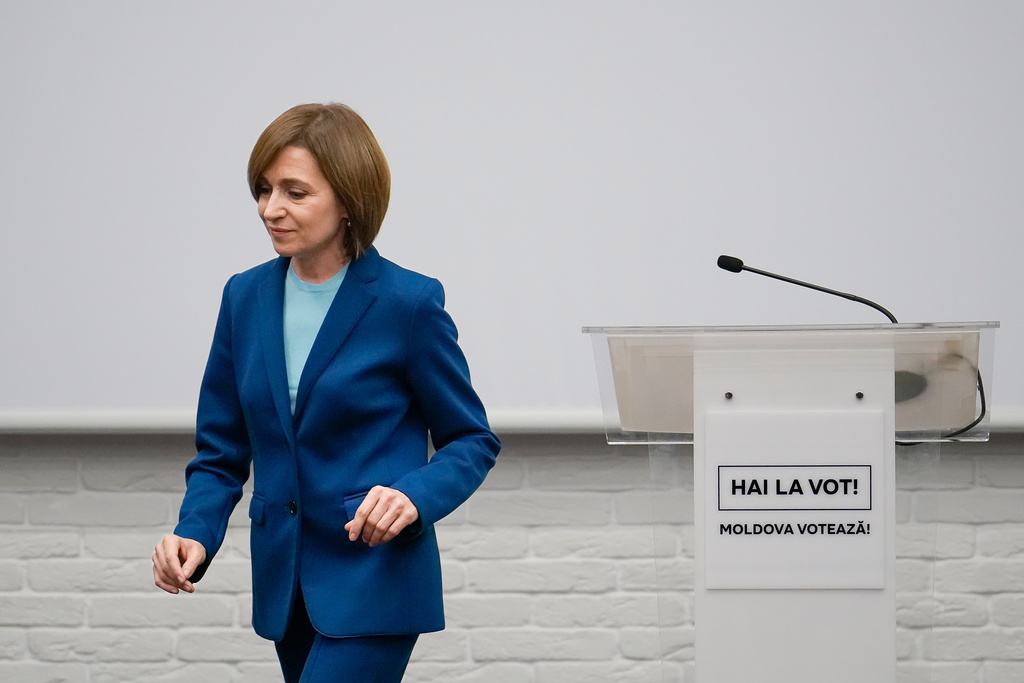 FILE - Moldova's President Maia Sandu leaves after speaking to the media during a press briefing after the polls closed for the presidential election runoff, in Chisinau, Moldova, Sunday, Nov. 3, 2024. (AP Photo/Vadim Ghirda, File)