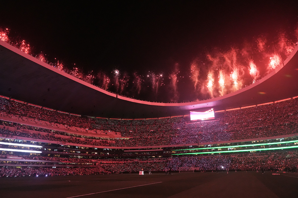 Fireworks go off at the halftime during the international friendly soccer match between Mexico and Portugal in Mexico City, Saturday, March 28, 2026. (AP Photo/Eduardo Verdugo)