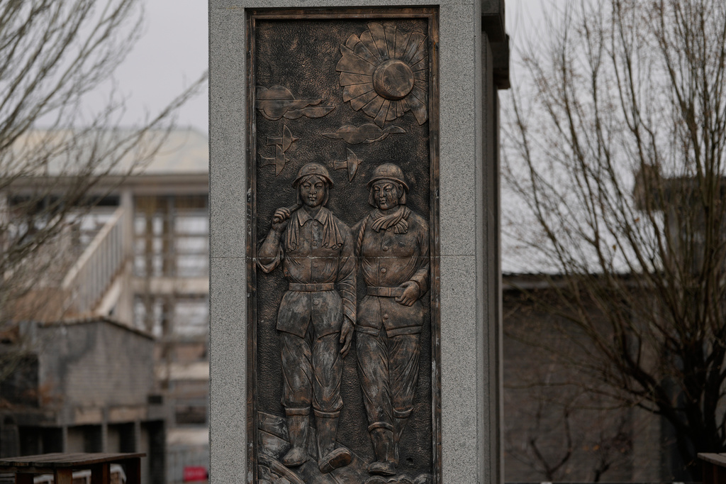 An statue depicting female miners stands at the Jinhuagong National Mine Park, a museum converted from a former section of the No. 9 mine in Datong, China on Friday, March 13, 2026. (AP Photo/Ng Han Guan)