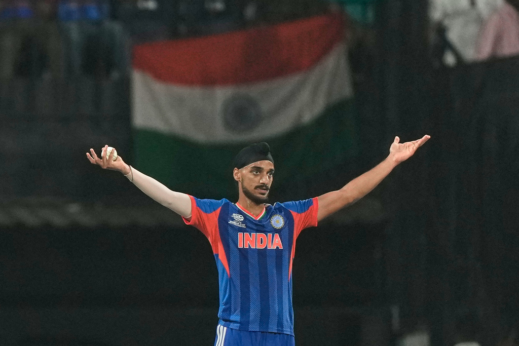 India's Arshdeep Singh celebrates the wicket of Zimbabwe's Ryan Burl during the T20 World Cup cricket match between India and Zimbabwe in Chennai, India, Thursday, Feb. 26, 2026. (AP Photo/Mahesh Kumar A.)