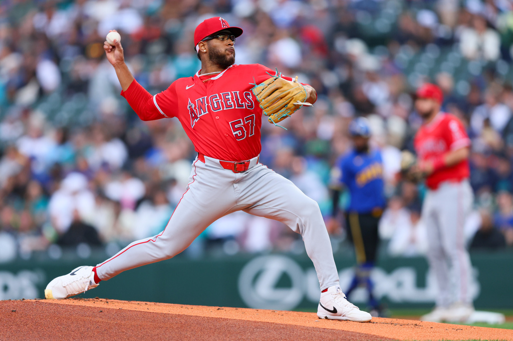 Los Angeles Angels pitcher Walbert Ureña delivers in the first inning of a baseball game against the Los Angeles Angels, Thursday, July 2, 2026, in Seattle. (AP Photo/Kevin Ng)